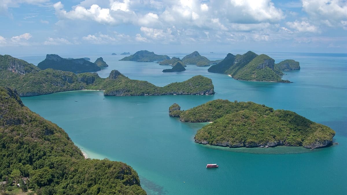 Green islands of Ang Thong under a cloudy sky